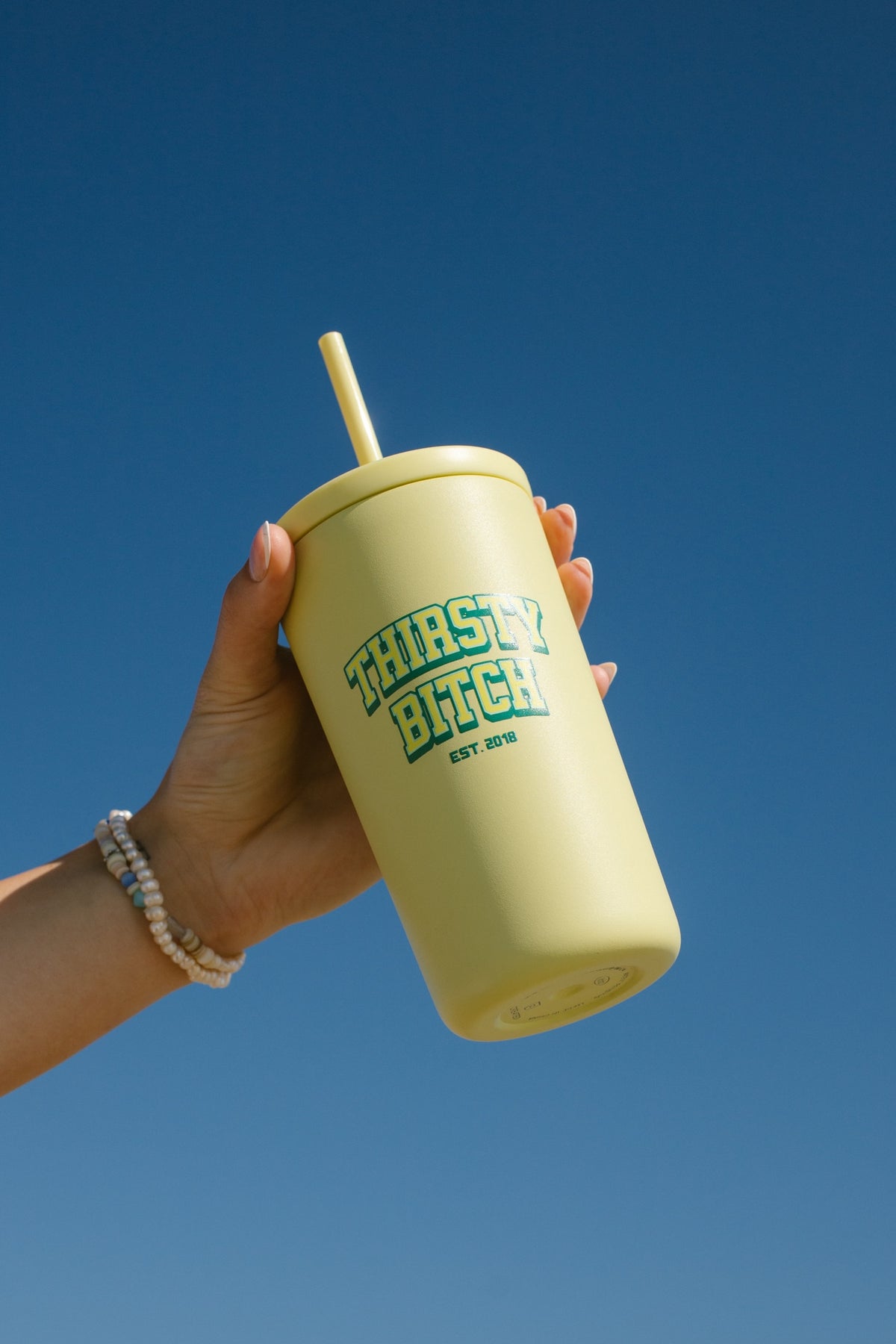 yellow tumbler that says thirsty bitch