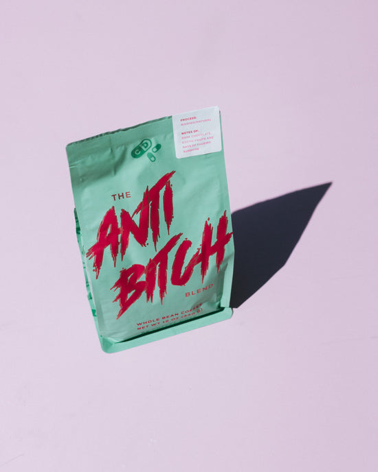 anti bitch blend coffee in a mint green bag