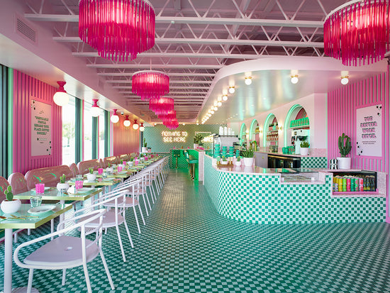inside view of pink and green diner style coffee shop